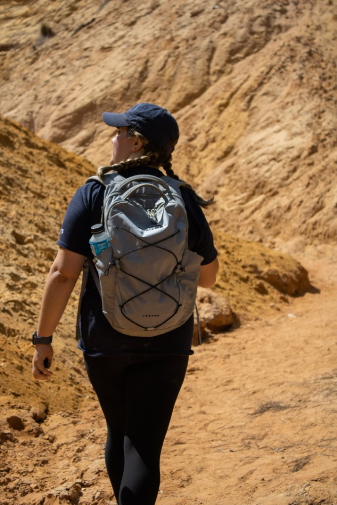 girl walking through Red Bluff